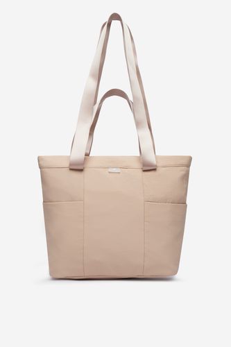 Torebka typu shopper widoczna z przodu, uchwyty skierowane ku górze.