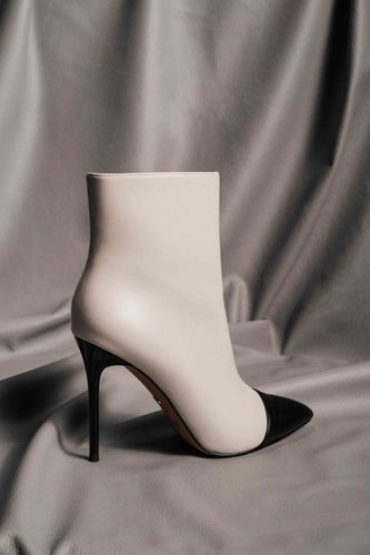 Gležnjarji NINE WEST CEO-MAYA-01 Buff