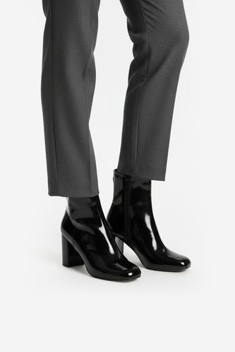 Gležnjarji NINE WEST CEO-TALA-01 Črna
