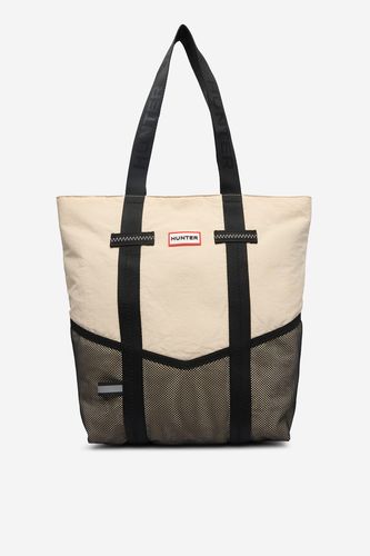 Torebka shopper widoczna z przodu, uchwyty skierowane ku górze.