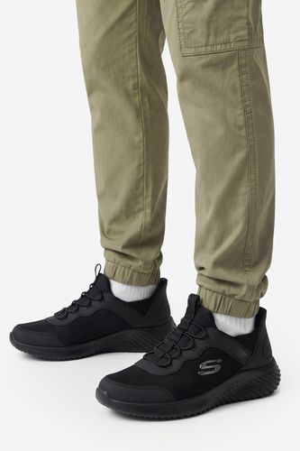 Sportovní obuv Skechers CEO-SLIPINS: BOUNDER  BRISK 403822L BBK Černá