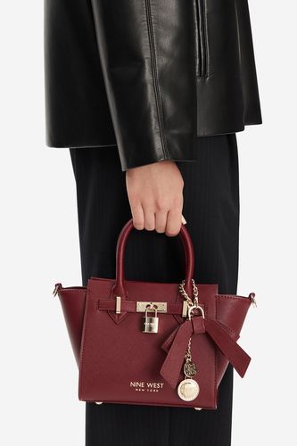 Torbica NINE WEST CEO-CHELSEA-CHARM-I-LX10187 Bordo rdeča