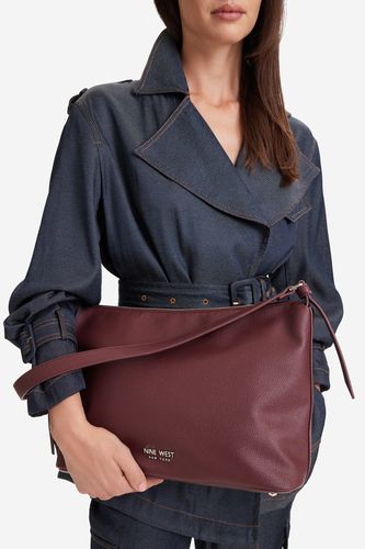 Torbica NINE WEST CEO-PRINCE STAR-LDA9530 Bordo rdeča