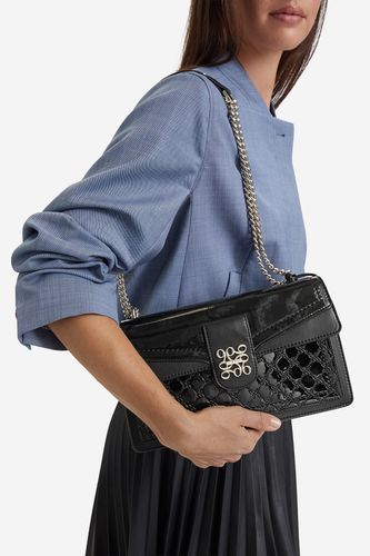 Torbica NINE WEST EO-SLEEK FORM-TK25740A Črna